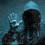 Young hacker in cybercrime concept